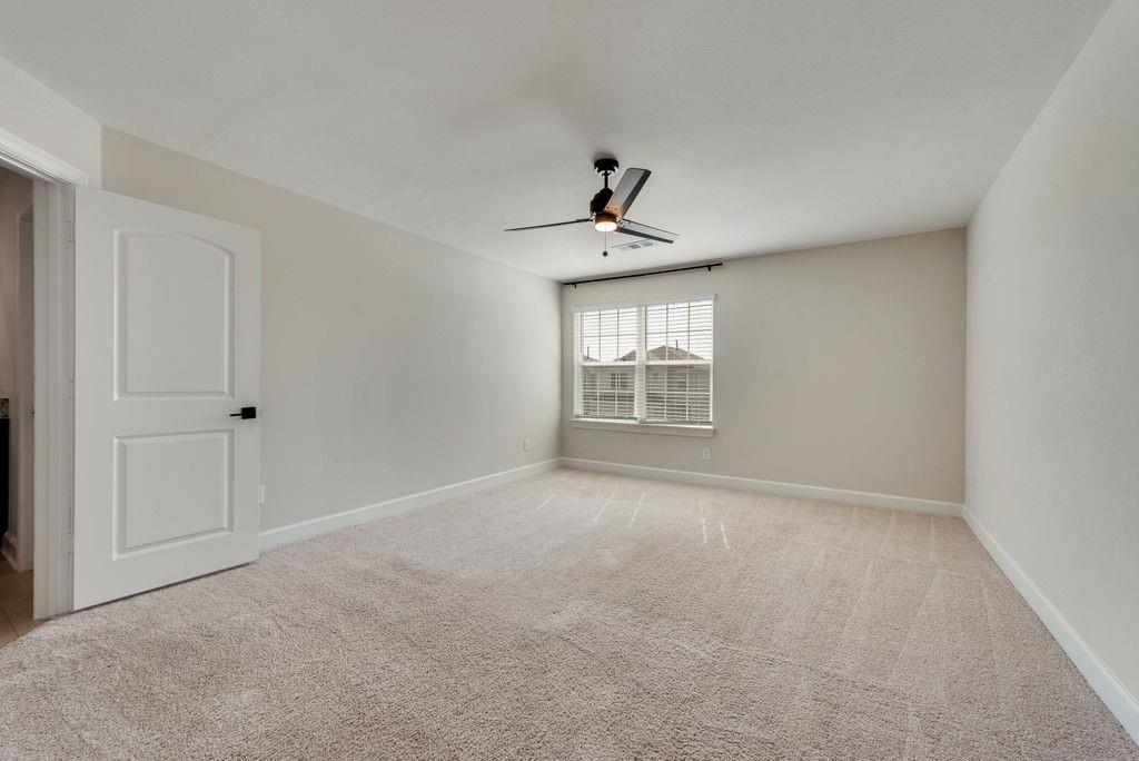 1421 Butler Avenue Princeton, TX 75407 - Photo 18 of 25 a view of an empty room with a window