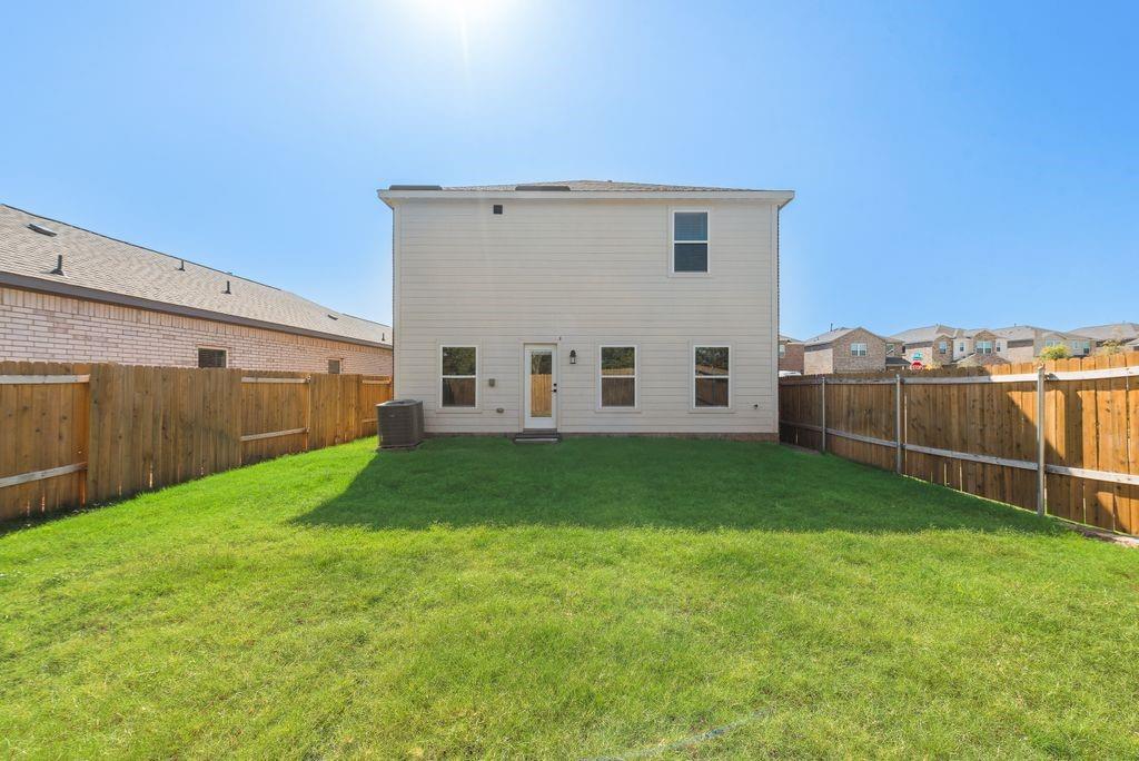 1421 Butler Avenue Princeton, TX 75407 - Photo 24 of 25 a view of a backyard with plants and a backyard