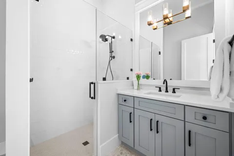 a en suite bathroom with a toilet sink and a bathtub