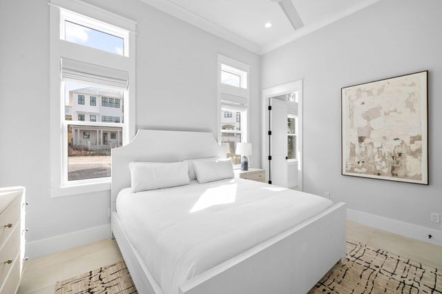 a bathroom with a granite countertop toilet sink and mirror