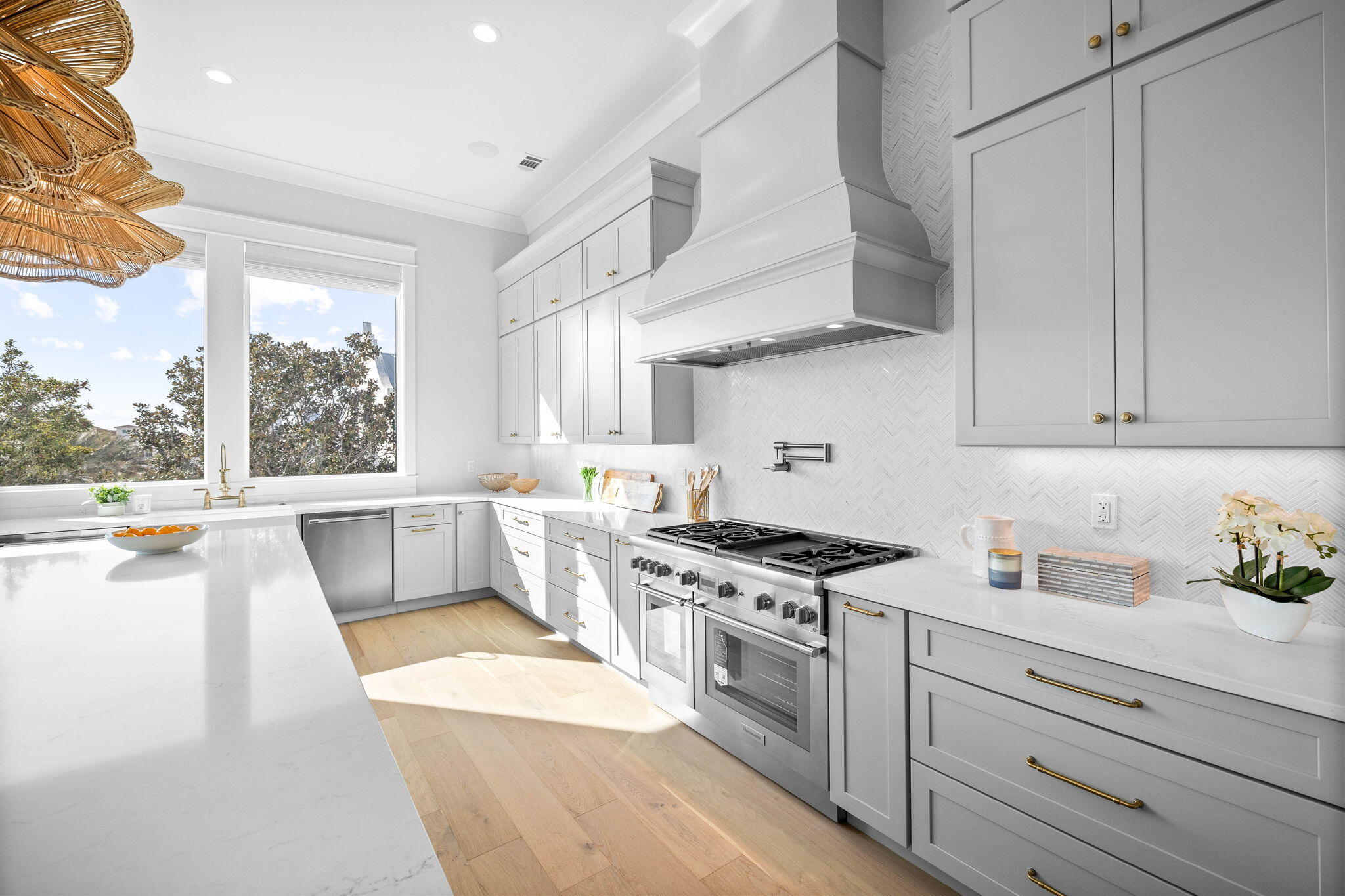 54 Marthas Lane Santa Rosa Beach, FL 32459 - Photo 25 of 59 a kitchen with stainless steel appliances granite countertop a stove a sink and a white cabinets