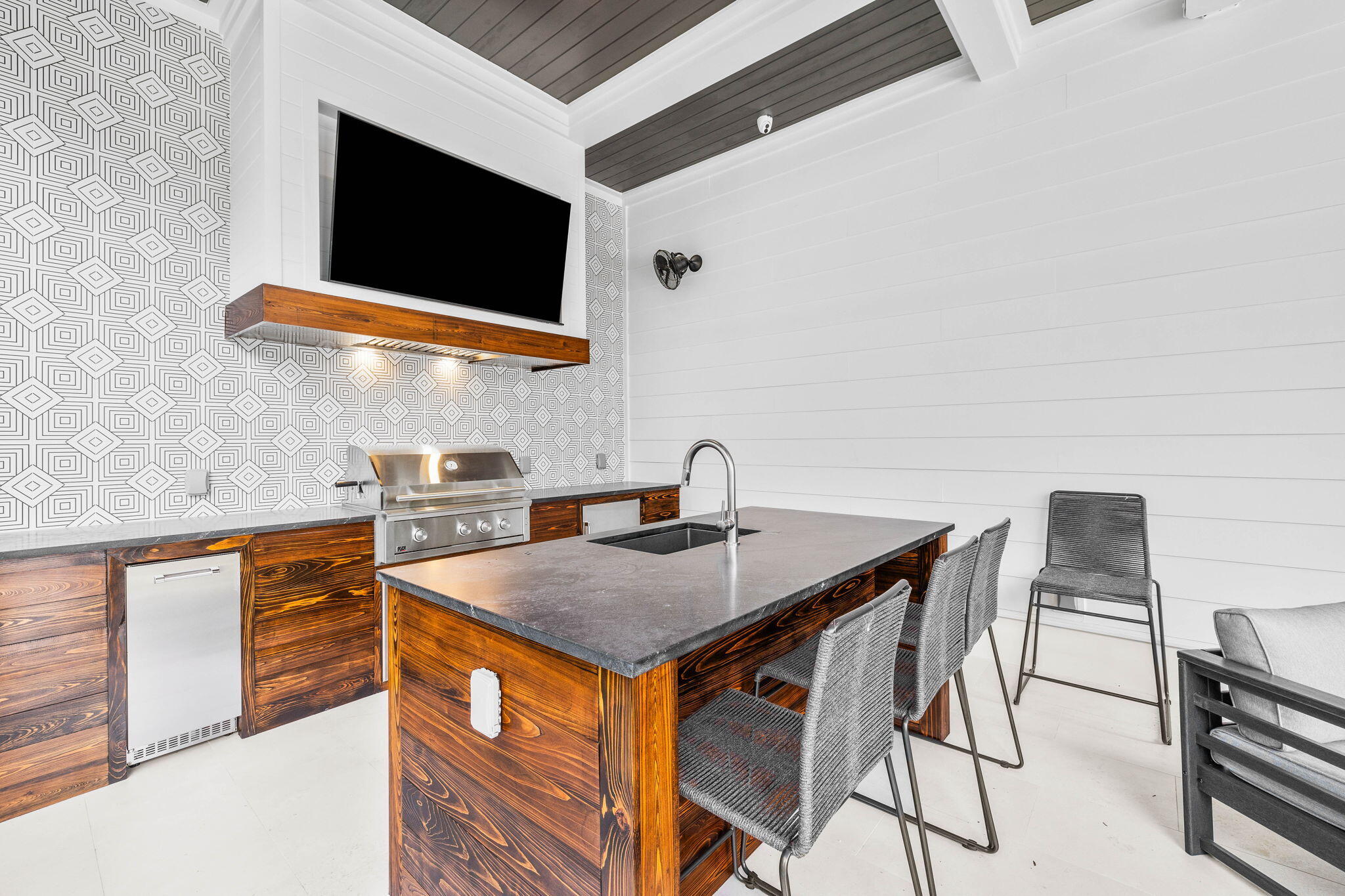 54 Marthas Lane Santa Rosa Beach, FL 32459 - Photo 10 of 59 a kitchen with stainless steel appliances granite countertop a stove a sink and a microwave