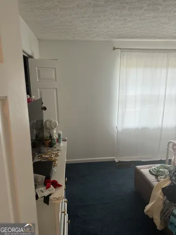 a bathroom with a sink toilet and vanity