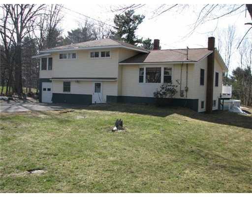 Exterior Front. Tri-Level home with...