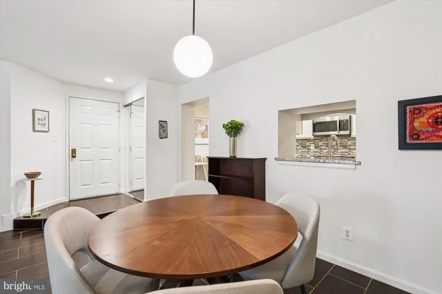 a workspace with furniture and wooden floor