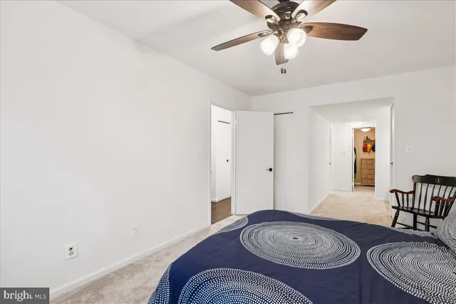a view of a livingroom with furniture and entryway