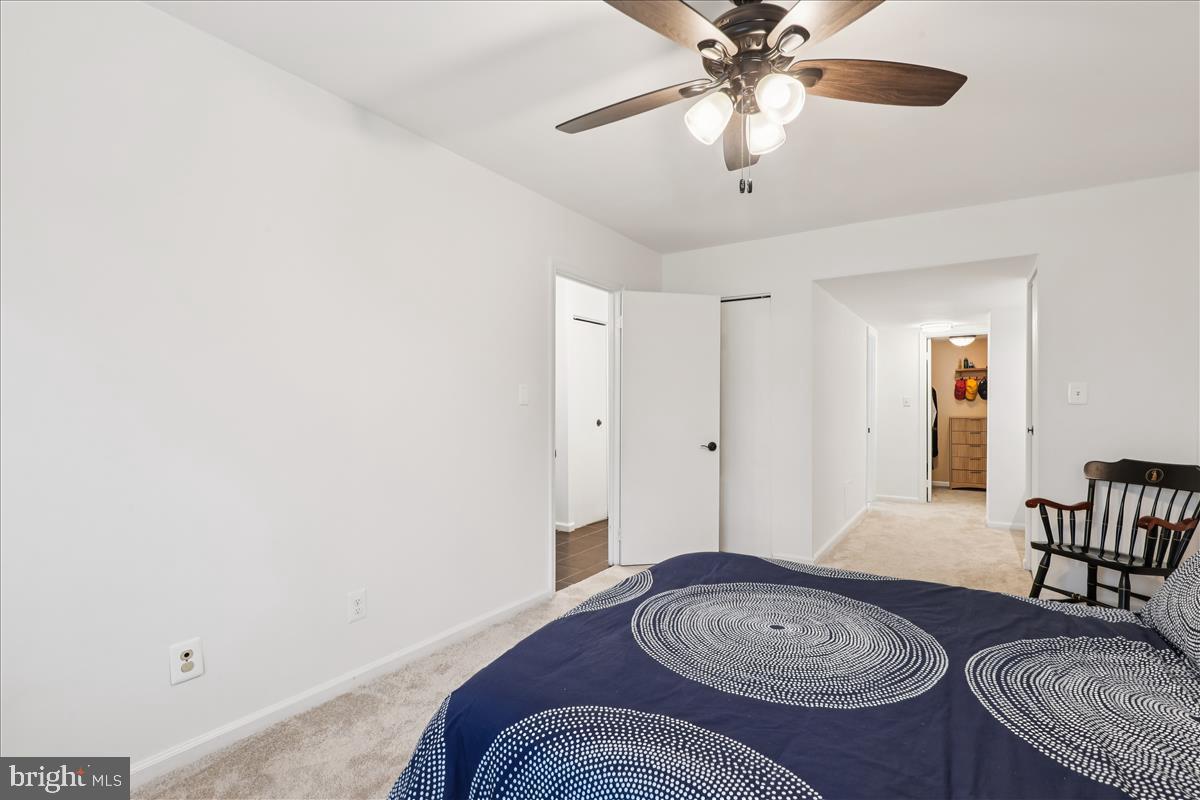 5802 Cove Landing Road, Unit 101 Burke, VA 22015 - Photo 16 of 35 a view of a livingroom with furniture and entryway