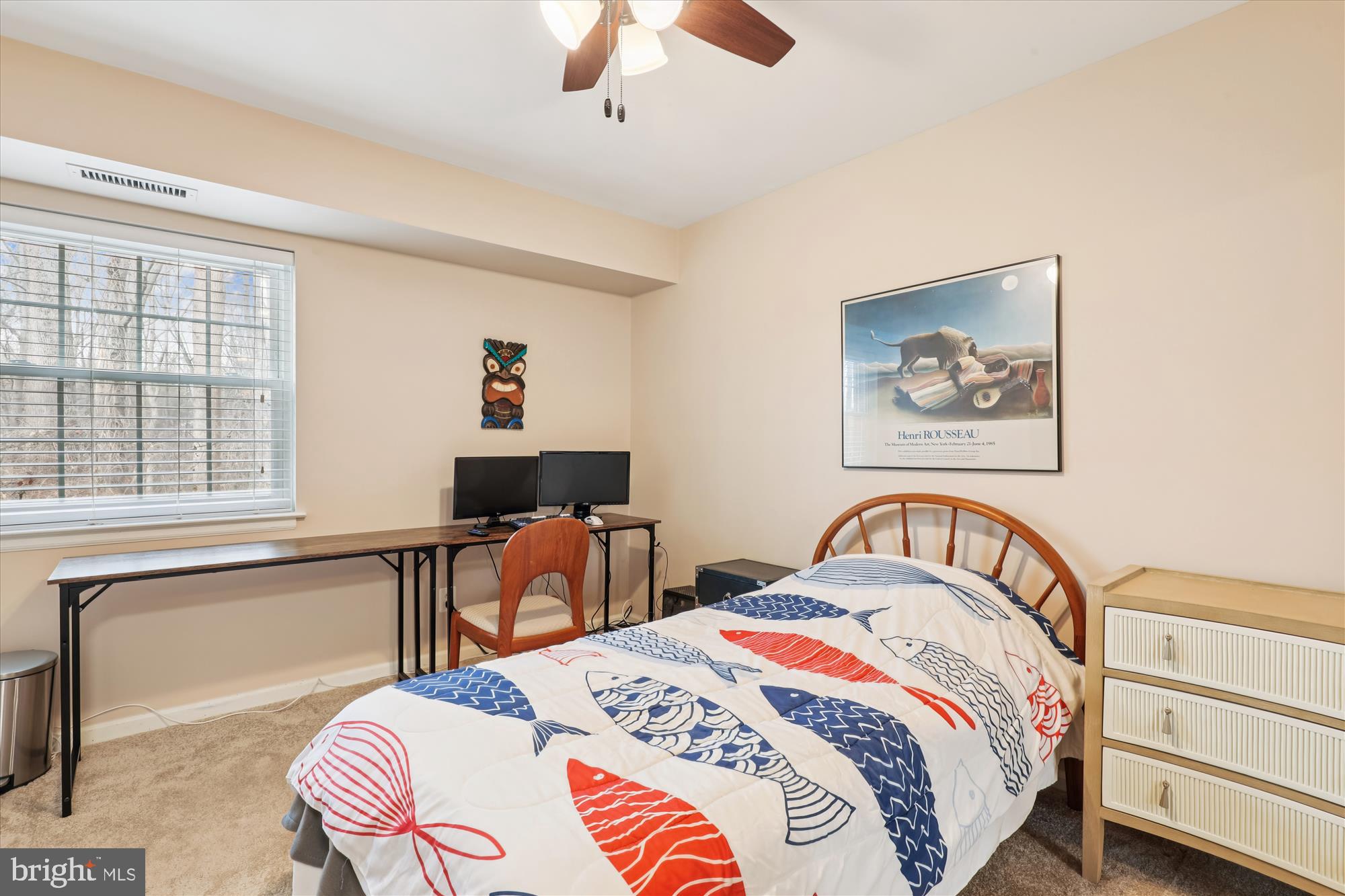 5802 Cove Landing Road, Unit 101 Burke, VA 22015 - Photo 20 of 35 a bedroom with bed and a large window