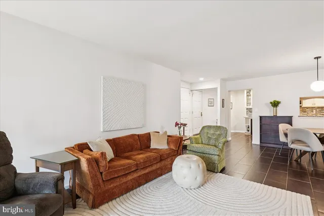 a view of a livingroom with furniture and wooden floor