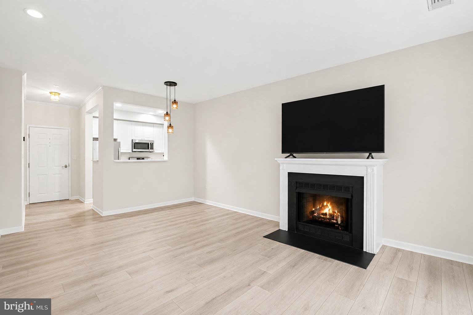 11775 Stratford House Place, Unit 112 Reston, VA 20190 - Photo 3 of 20 Living room/Fresh Flooring