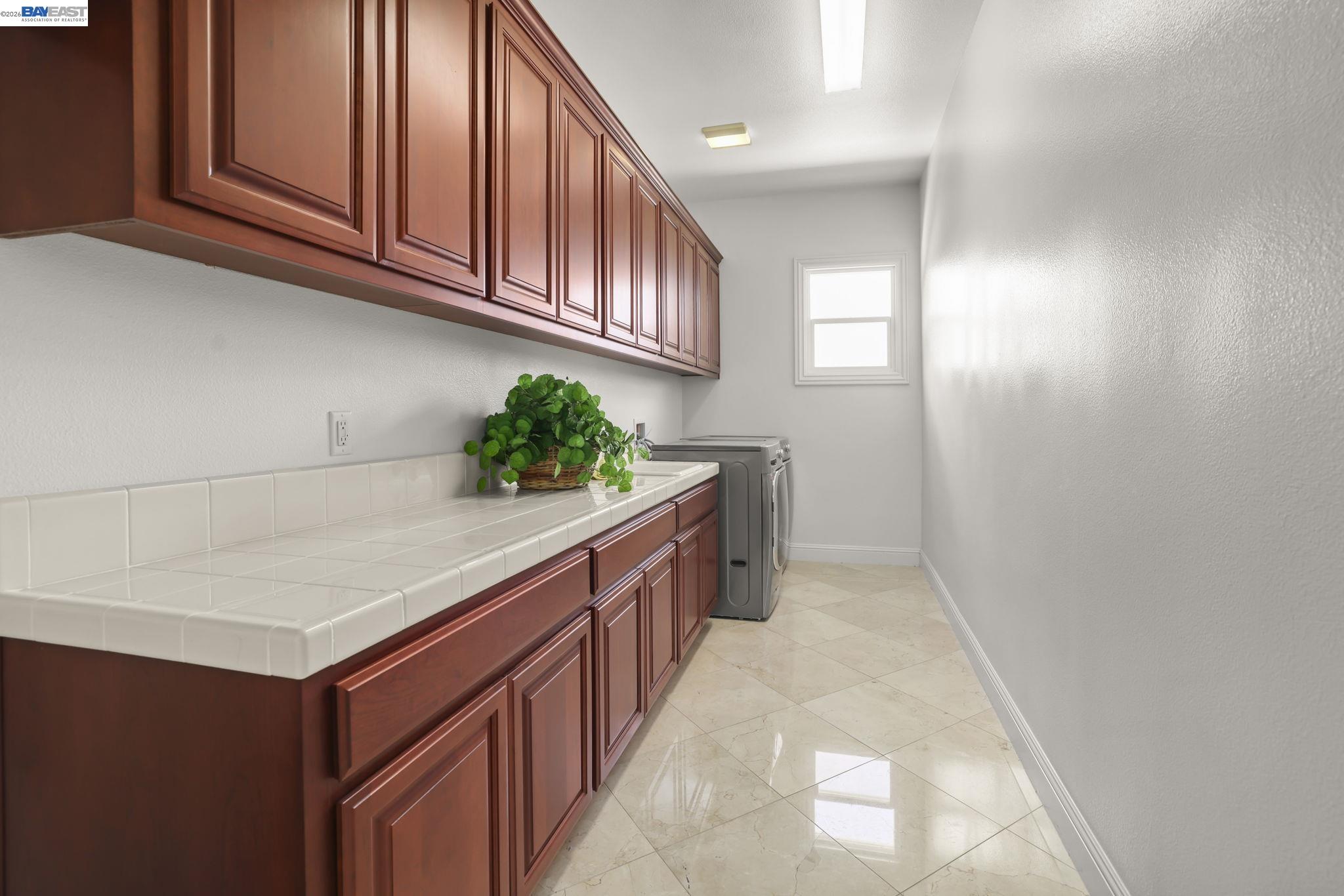 950 Winsford Court San Ramon, CA 94583 - Photo 17 of 68 a kitchen with stainless steel appliances granite countertop a sink and a cabinets