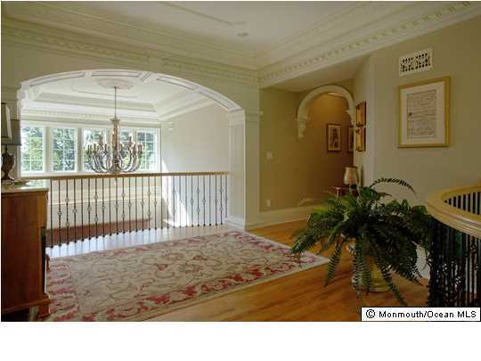 22 Heathcliff Road Rumson, NJ 07760 - Photo 12 of 19 a black and white photo of a porch