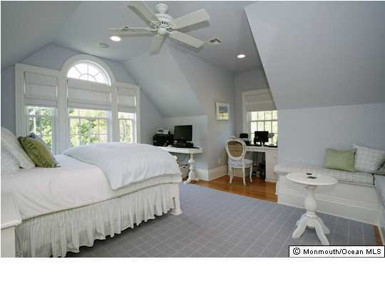 22 Heathcliff Road Rumson, NJ 07760 - Photo 16 of 19 a living room with furniture and a chandelier