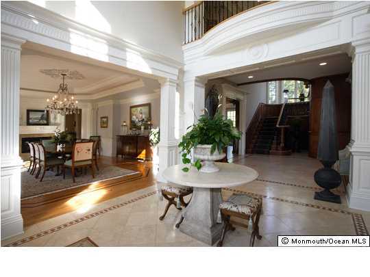 22 Heathcliff Road Rumson, NJ 07760 - Photo 3 of 19 a living room with furniture and a potted plant