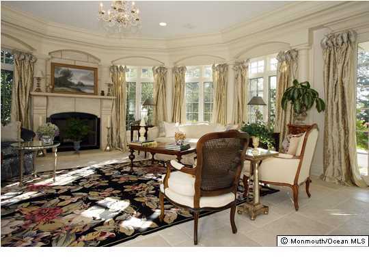 22 Heathcliff Road Rumson, NJ 07760 - Photo 6 of 19 a living room with furniture and a fireplace
