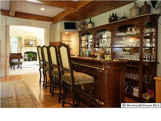 22 Heathcliff Road Rumson, NJ 07760 - Photo 8 of 19 a black and white photo of a living room