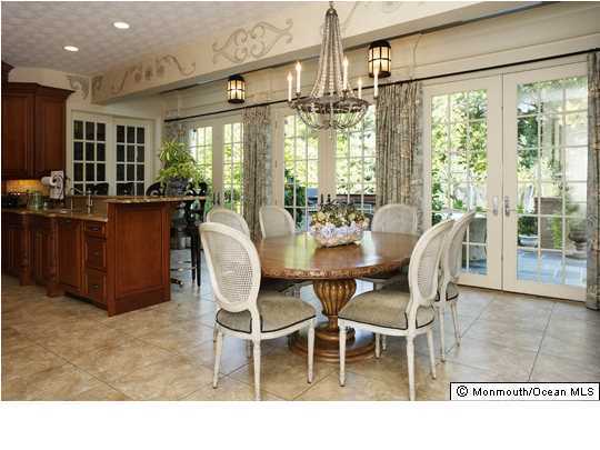 22 Heathcliff Road Rumson, NJ 07760 - Photo 10 of 19 a dining room with furniture a chandelier and wooden floor
