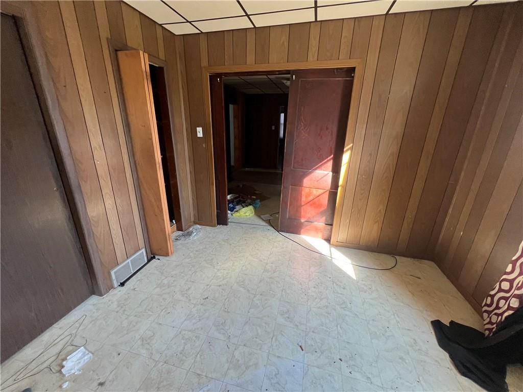 86 Southview Road McDonald, PA 15057 - Photo 6 of 16 a view of a closet with wooden floor and a window