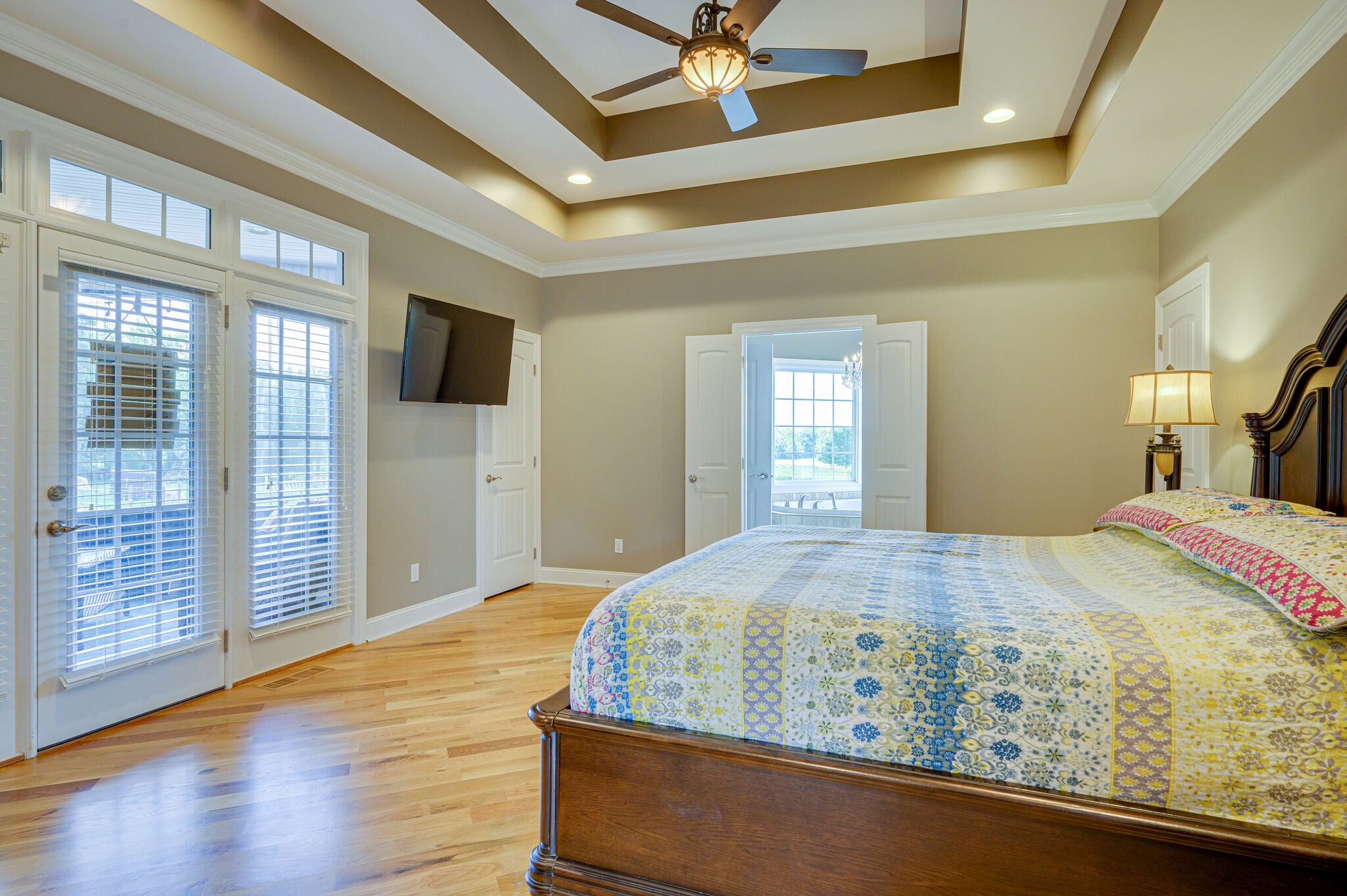 775 Ivy Lake Road Morrison, TN 37357 - Photo 18 of 69 a bed sitting in a spacious bedroom next to a window