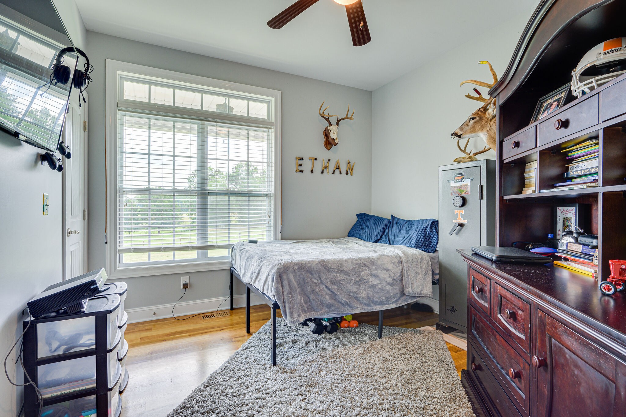 775 Ivy Lake Road Morrison, TN 37357 - Photo 23 of 69 a bedroom with a bed and a tv on the dresser