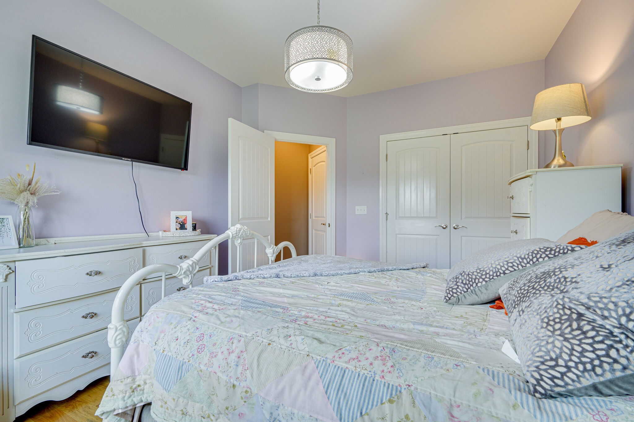 775 Ivy Lake Road Morrison, TN 37357 - Photo 25 of 69 a bedroom with a bed and flat screen tv