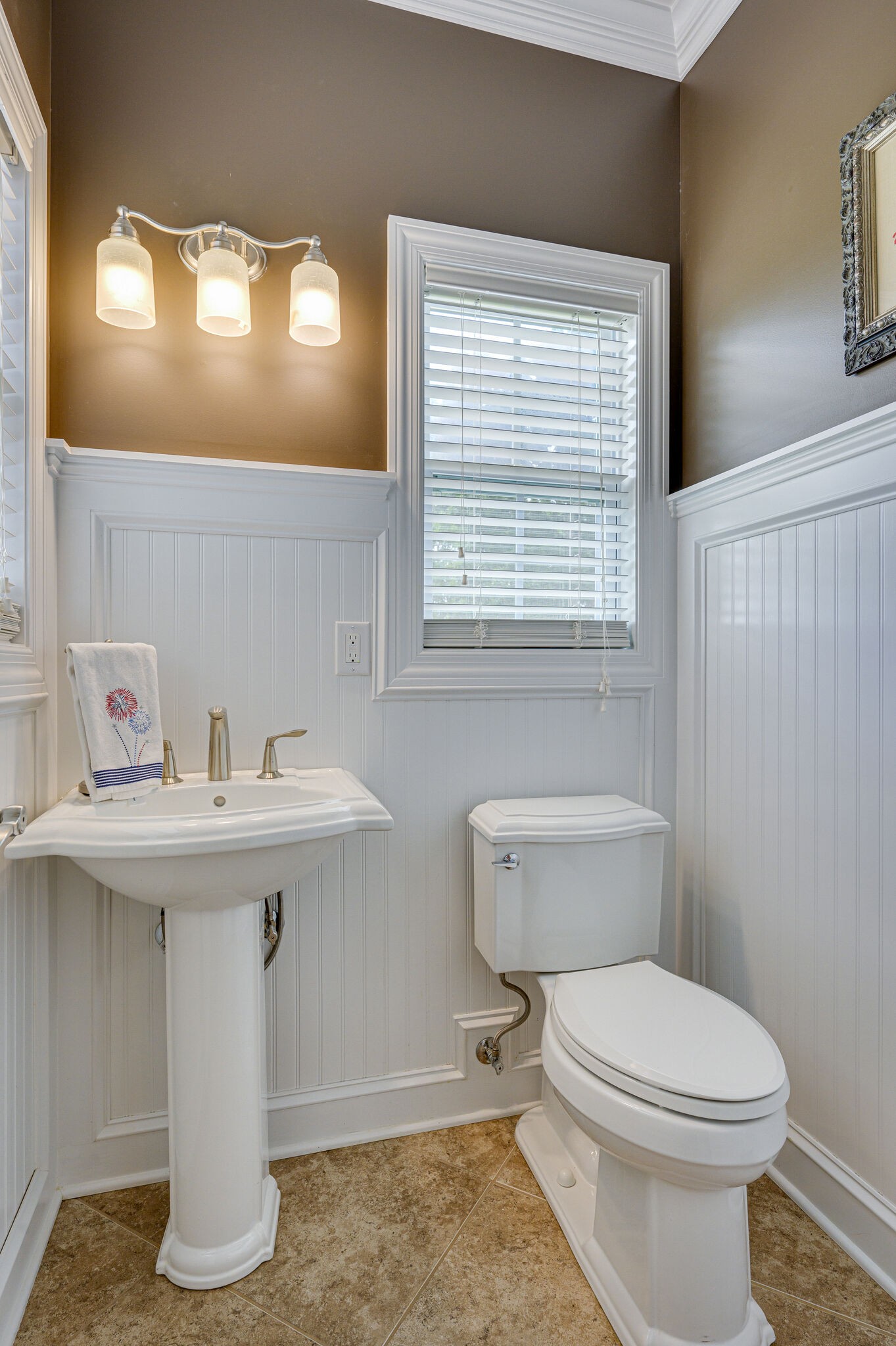 775 Ivy Lake Road Morrison, TN 37357 - Photo 28 of 69 a bathroom with a sink toilet and a window