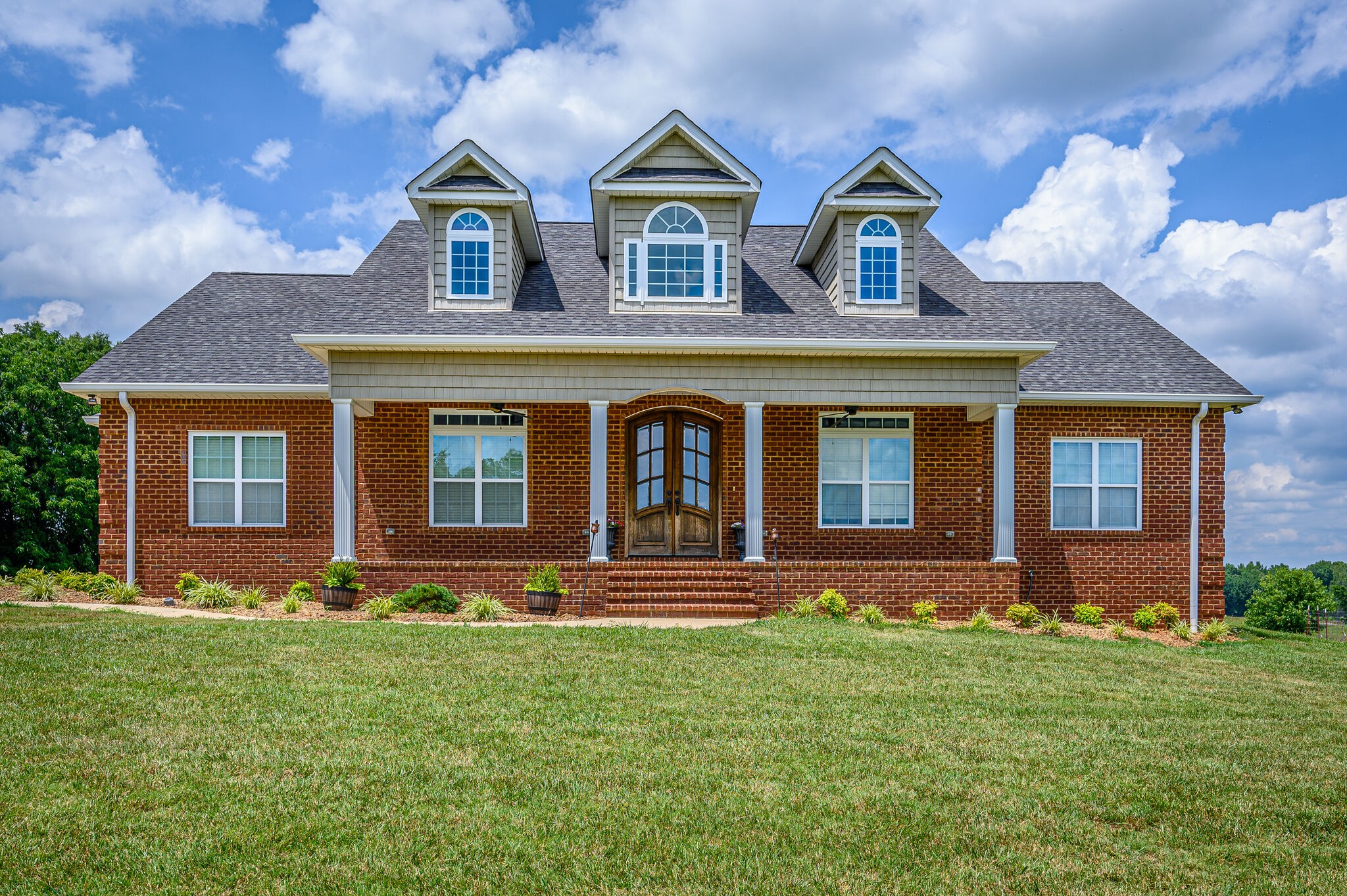 775 Ivy Lake Road Morrison, TN 37357 - Photo 3 of 69 front view of house with a yard