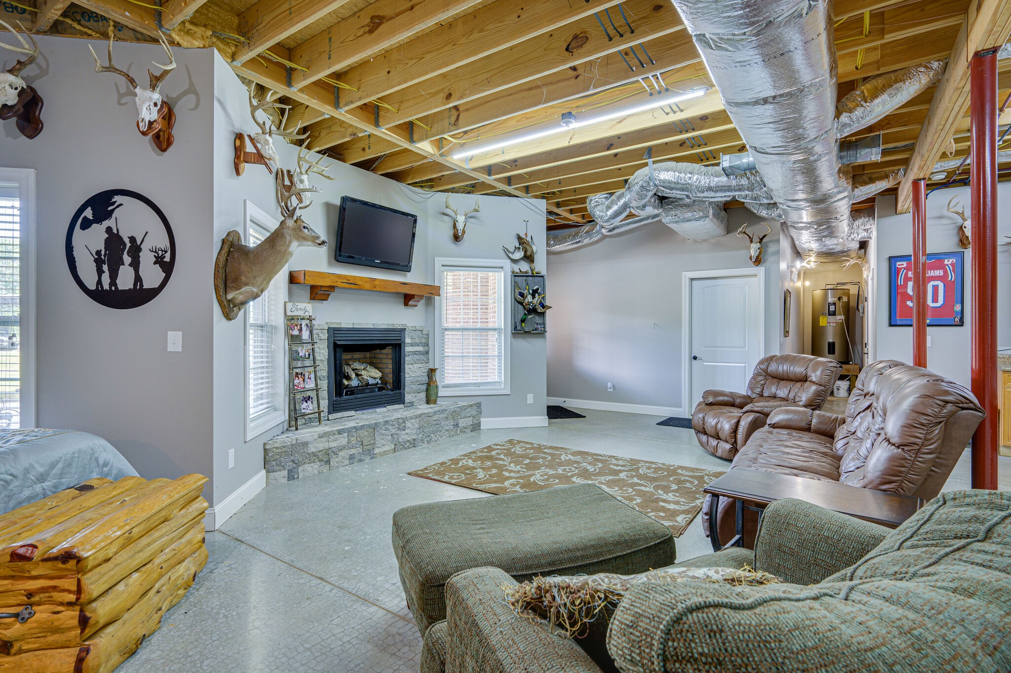 775 Ivy Lake Road Morrison, TN 37357 - Photo 32 of 69 a living room with furniture and a fireplace