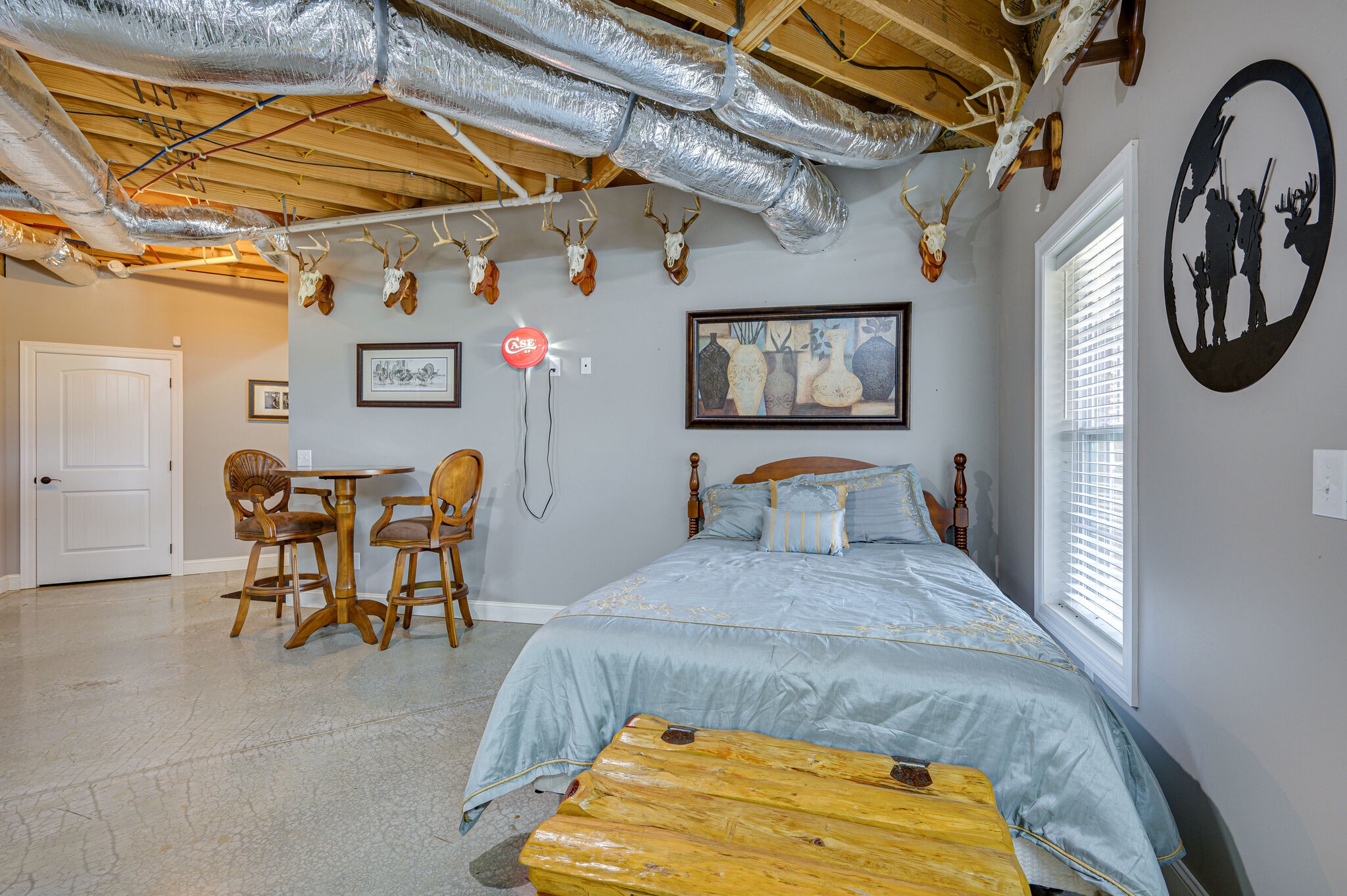 775 Ivy Lake Road Morrison, TN 37357 - Photo 34 of 69 a bedroom with a bed and a table in it