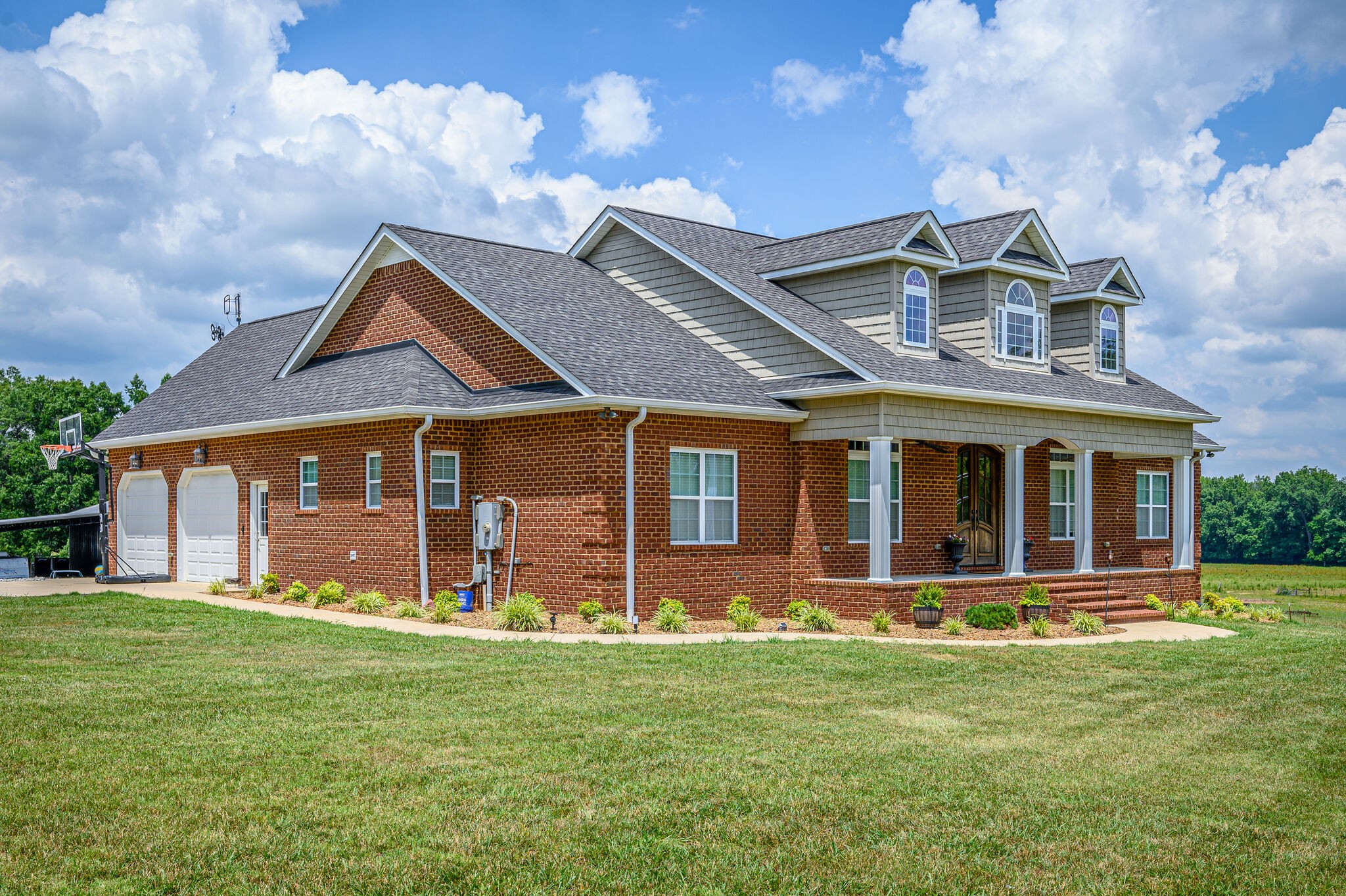 775 Ivy Lake Road Morrison, TN 37357 - Photo 4 of 69 front view of a house with a yard