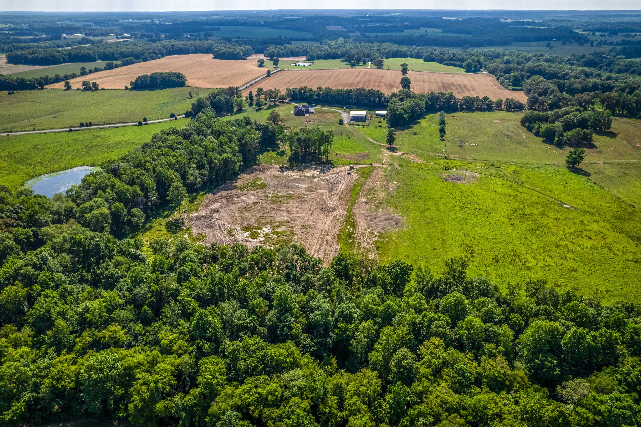 775 Ivy Lake Road Morrison, TN 37357 - Photo 60 of 69 an aerial view of a houses with a lush green hillside and houses