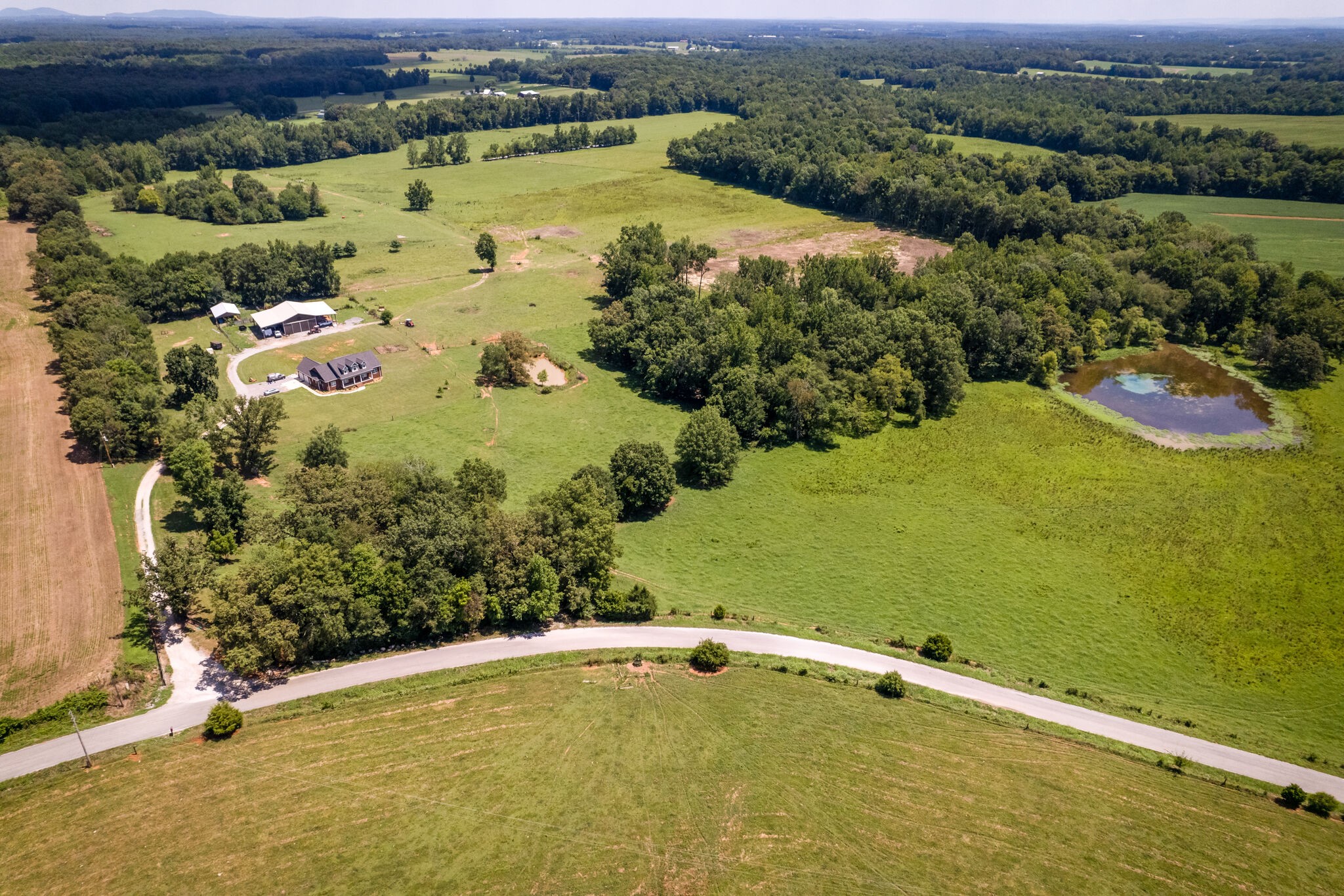 775 Ivy Lake Road Morrison, TN 37357 - Photo 64 of 69 an aerial view of a residential houses with outdoor space and lake view