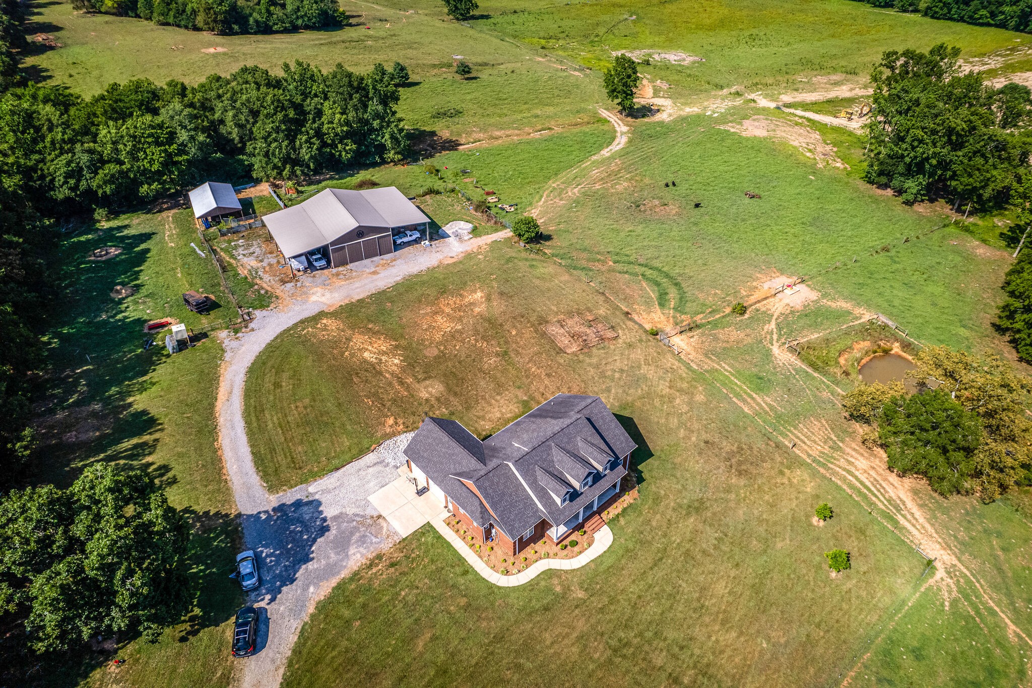 775 Ivy Lake Road Morrison, TN 37357 - Photo 65 of 69 an aerial view of a house with outdoor space swimming pool and lake view