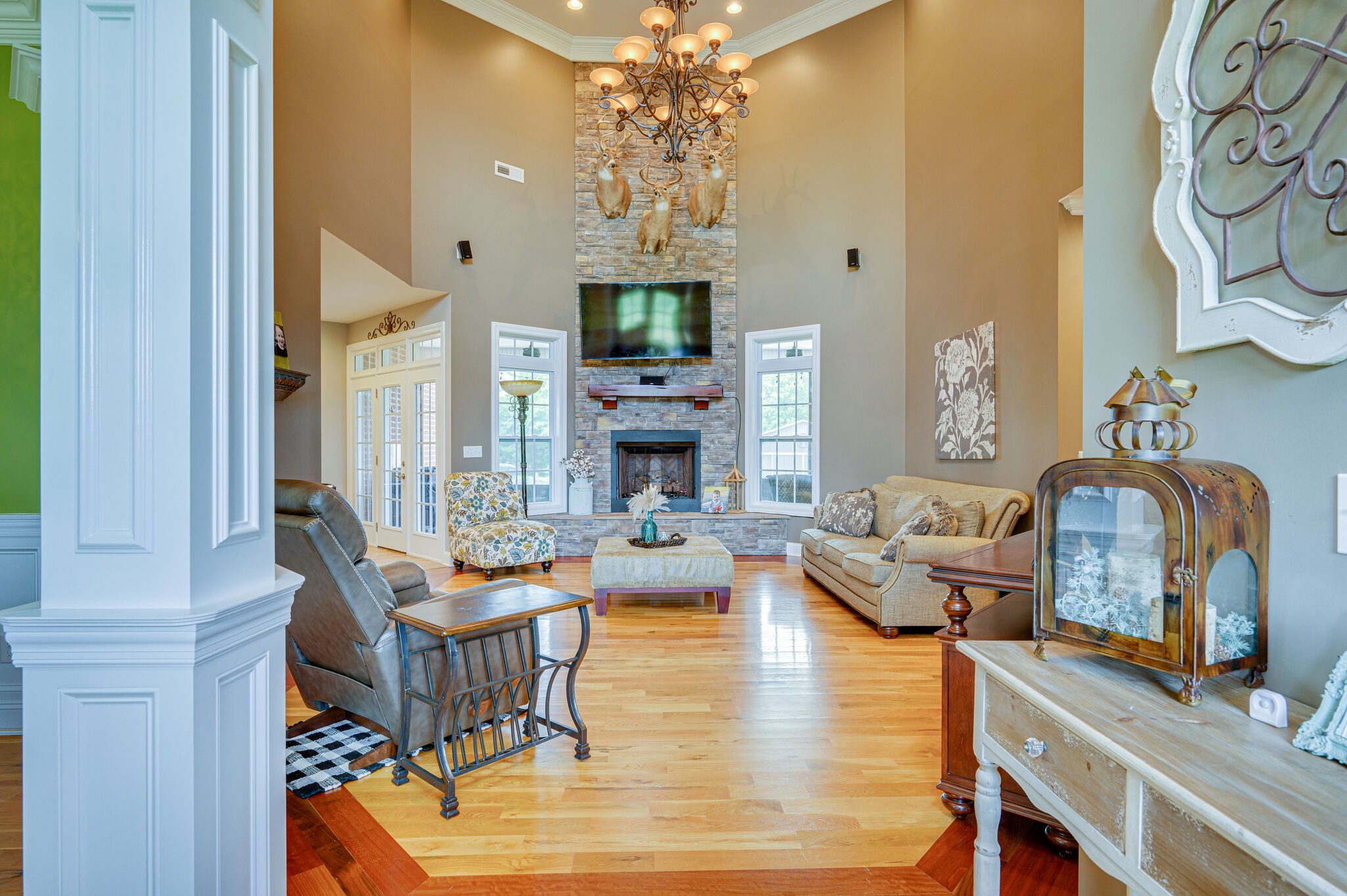 775 Ivy Lake Road Morrison, TN 37357 - Photo 8 of 69 a living room with fireplace furniture and a chandelier