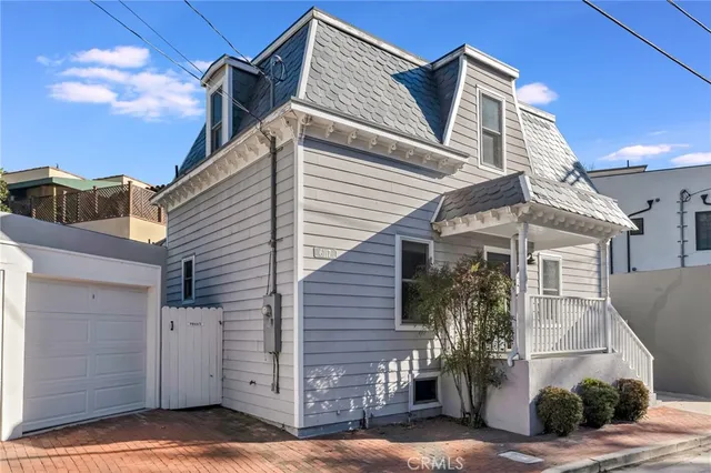 a view of a house with a garage