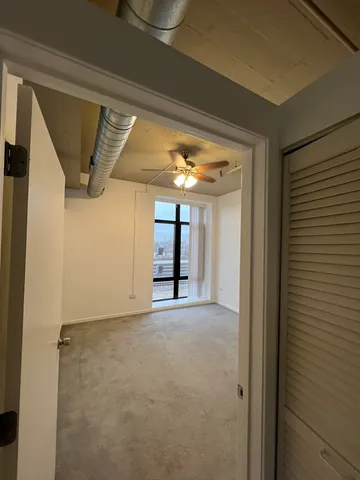 a view of a room with an entryway