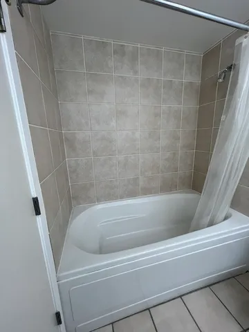 a bathroom with a bathtub