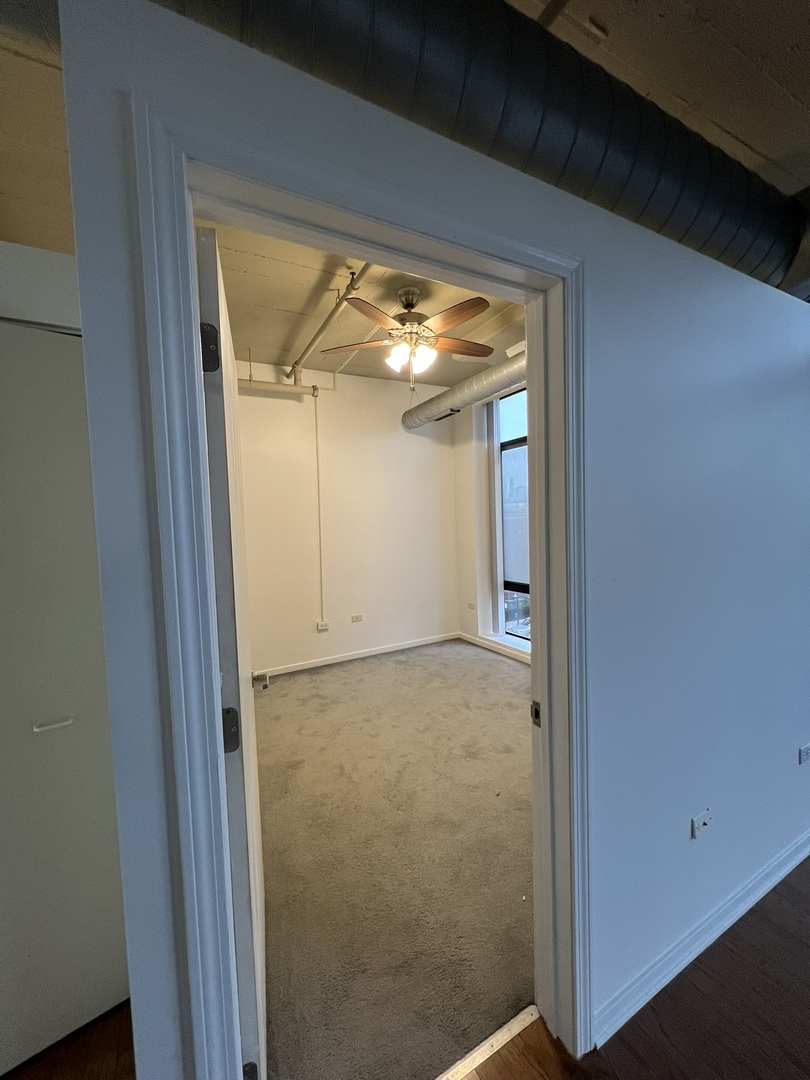 1525 South Sangamon Street, Unit 317P Chicago, IL 60608 - Photo 5 of 27 a view of empty room