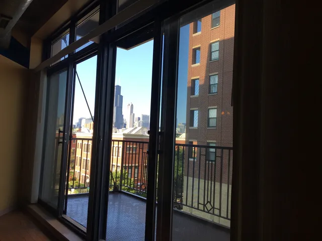a view of a balcony with city view