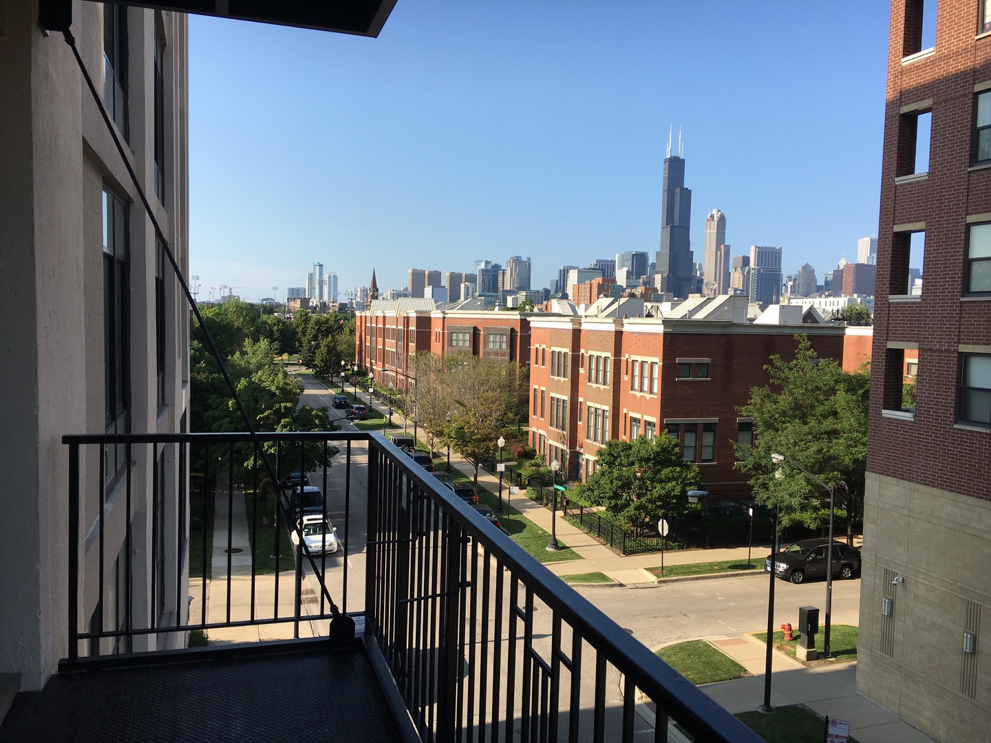 1525 South Sangamon Street, Unit 317P Chicago, IL 60608 - Photo 8 of 27 a view of a balcony with city view
