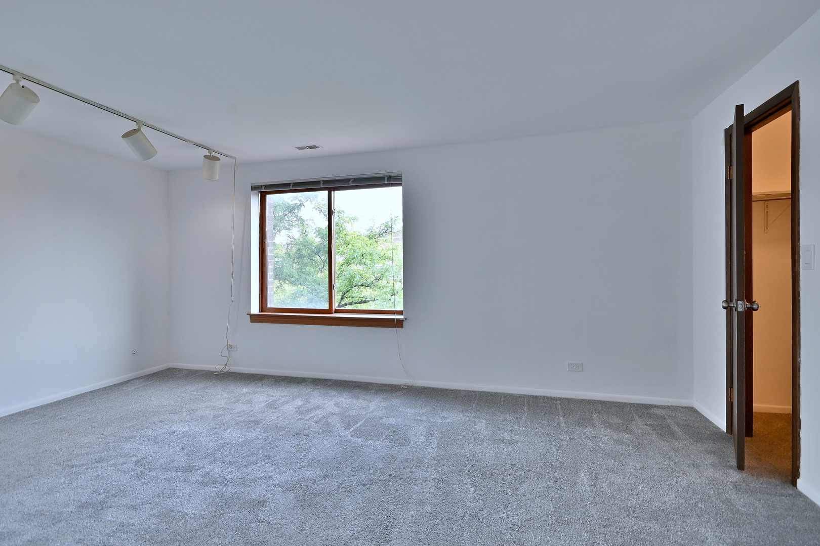 711 South River Road, Unit 508 Des Plaines, IL 60016 - Photo 19 of 41 a view of an empty room with a window