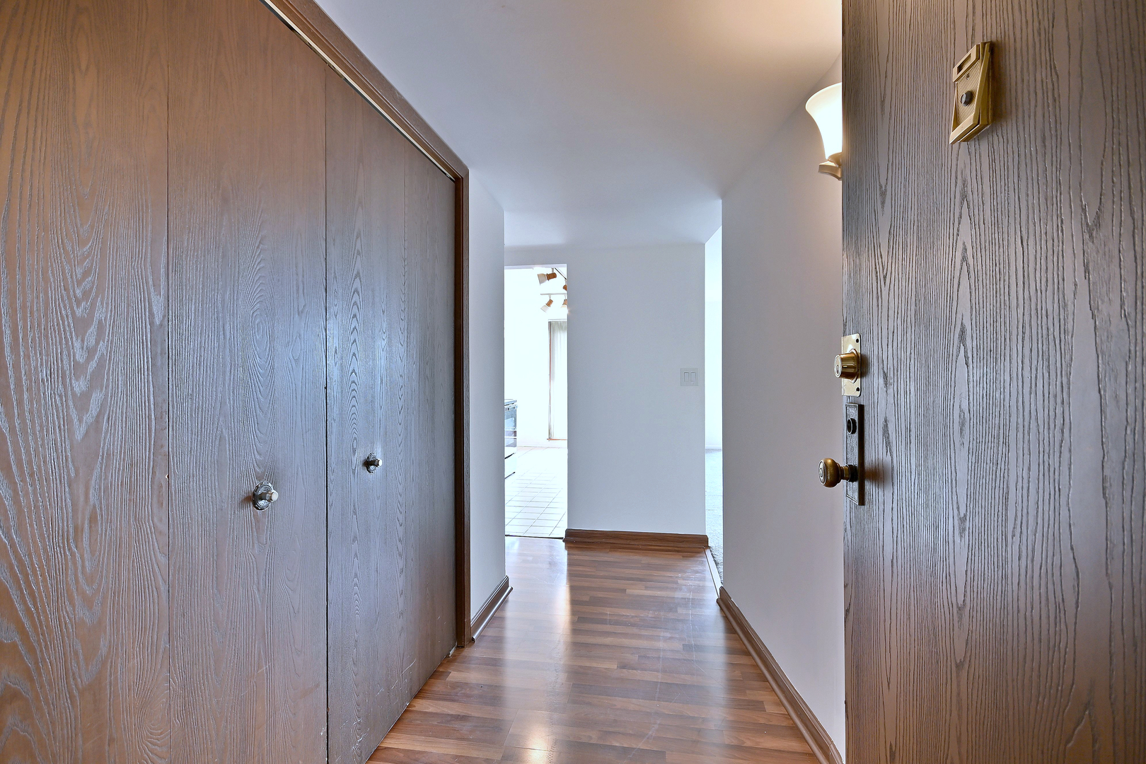711 South River Road, Unit 508 Des Plaines, IL 60016 - Photo 25 of 41 a view of a hallway with wooden floor