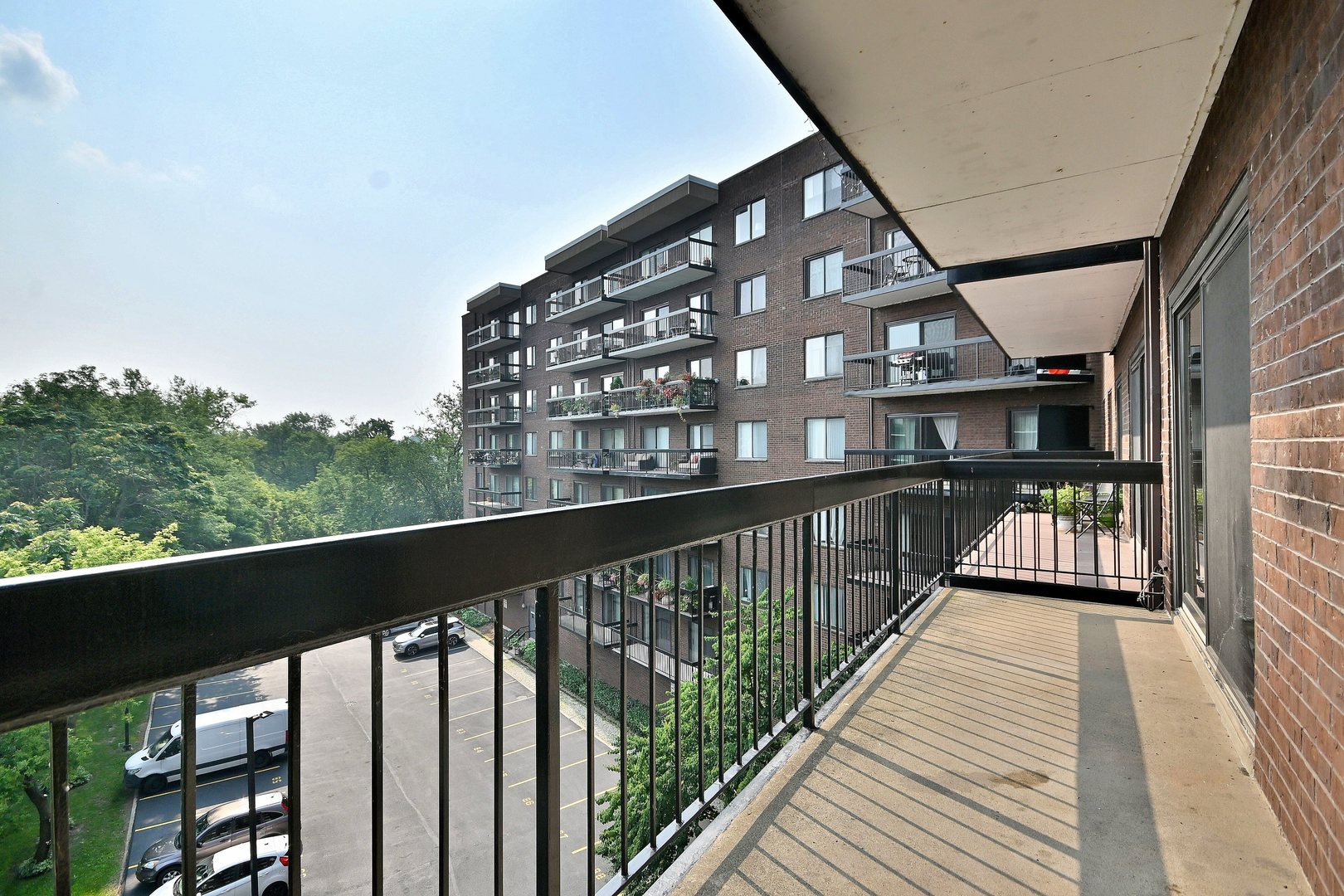 711 South River Road, Unit 508 Des Plaines, IL 60016 - Photo 26 of 41 a view of a building from a balcony