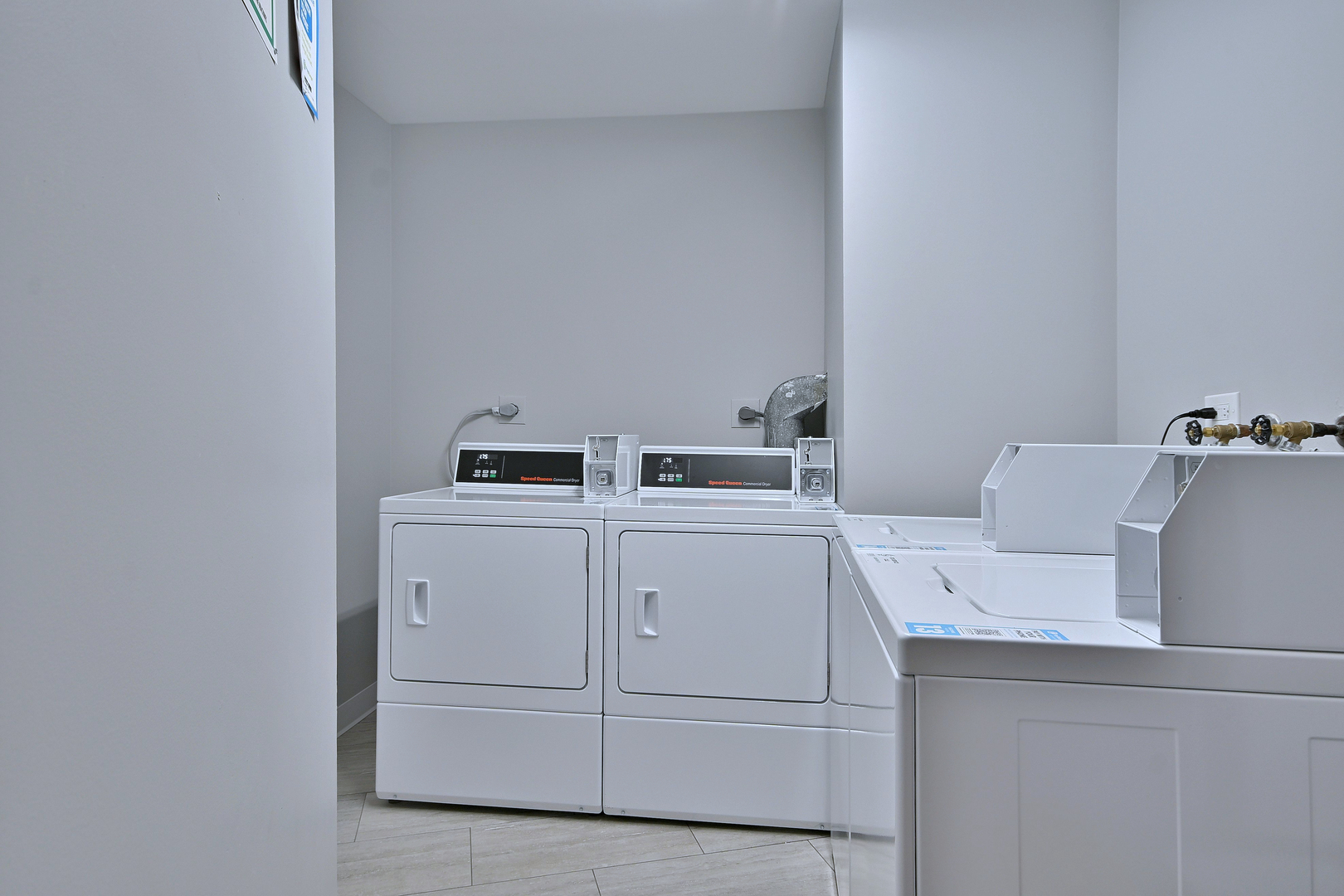 711 South River Road, Unit 508 Des Plaines, IL 60016 - Photo 32 of 41 a utility room with dryer and washer