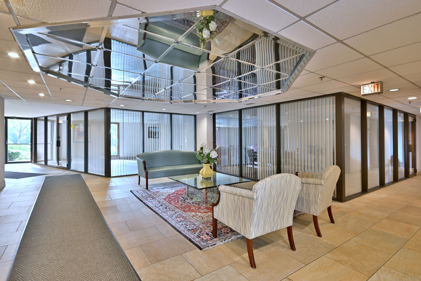 711 South River Road, Unit 508 Des Plaines, IL 60016 - Photo 34 of 41 a view of a patio with a table and chairs