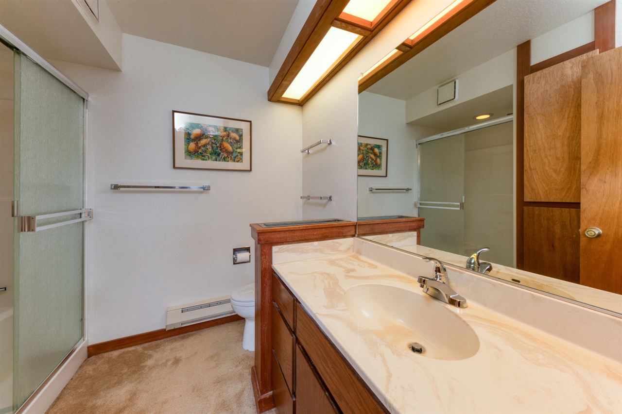 92 Graeagle Meadows Road Graeagle, CA 96103 - Photo 12 of 19 a bathroom with a sink and a mirror