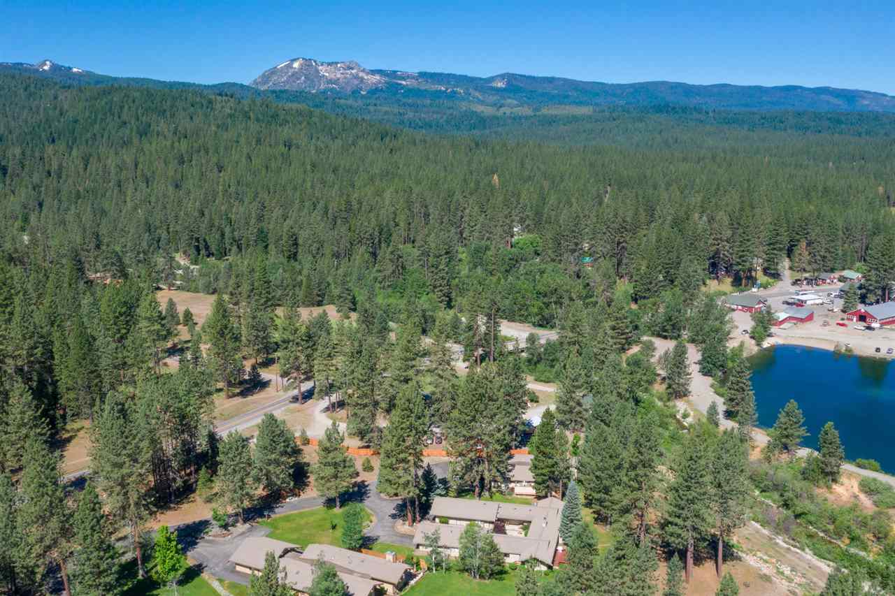 92 Graeagle Meadows Road Graeagle, CA 96103 - Photo 19 of 19 a view of a lush green hillside and houses