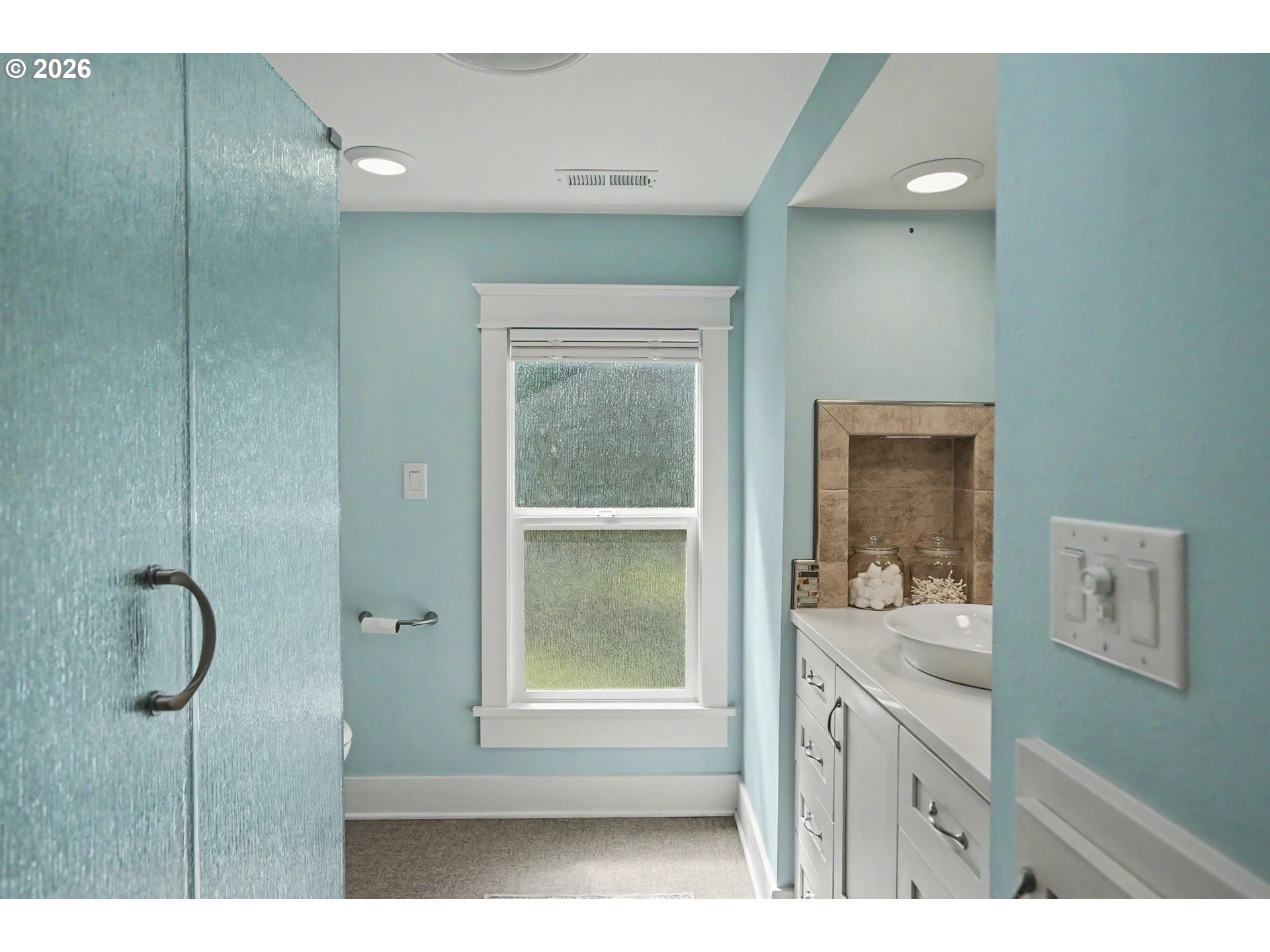 15055 Southeast Foster Road Dayton, OR 97114 - Photo 35 of 47 a bathroom with a shower sink and mirror