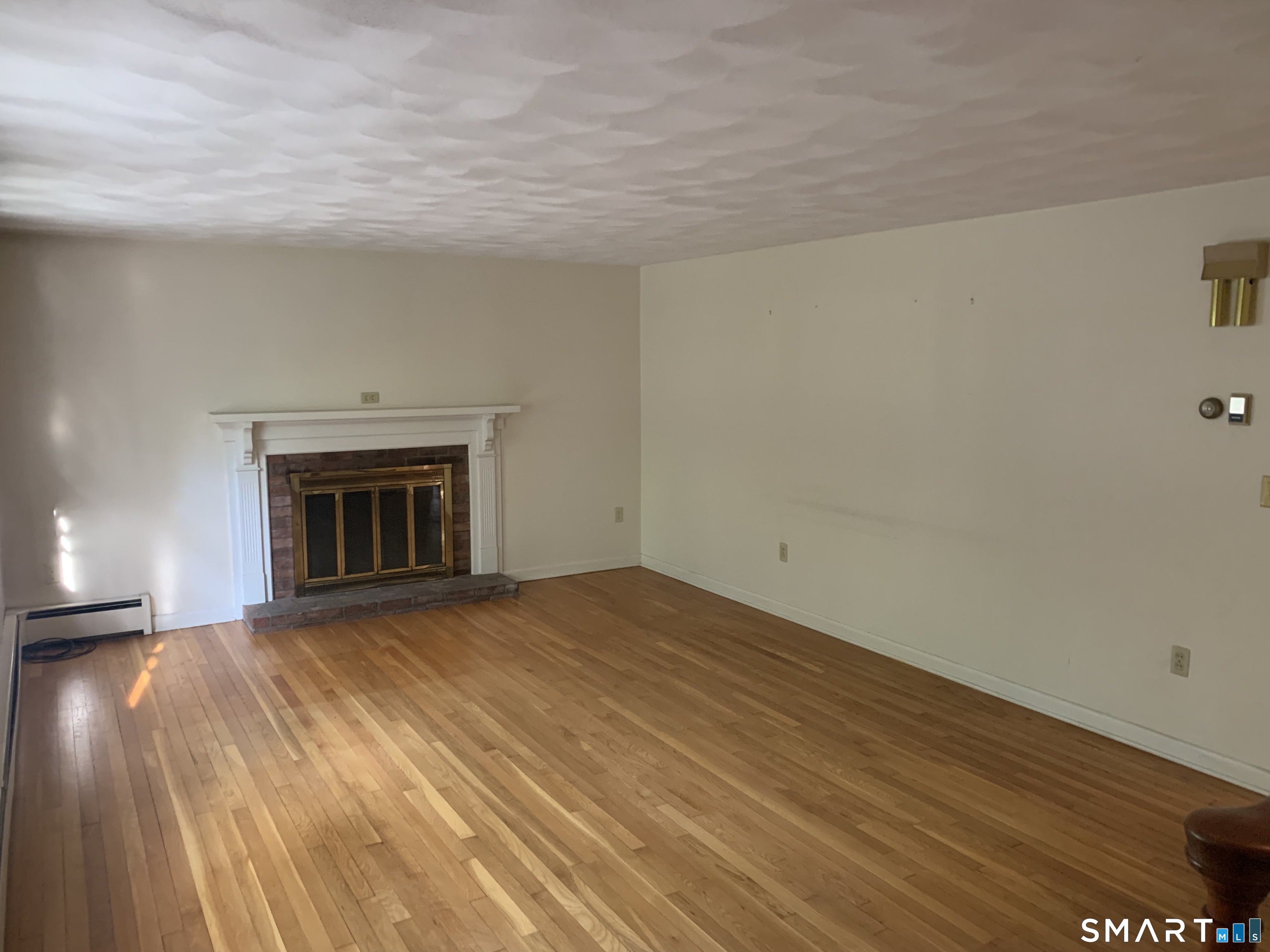 46 Mashapaug Road Union, CT 06076 - Photo 11 of 26 Living Room w/Fireplace