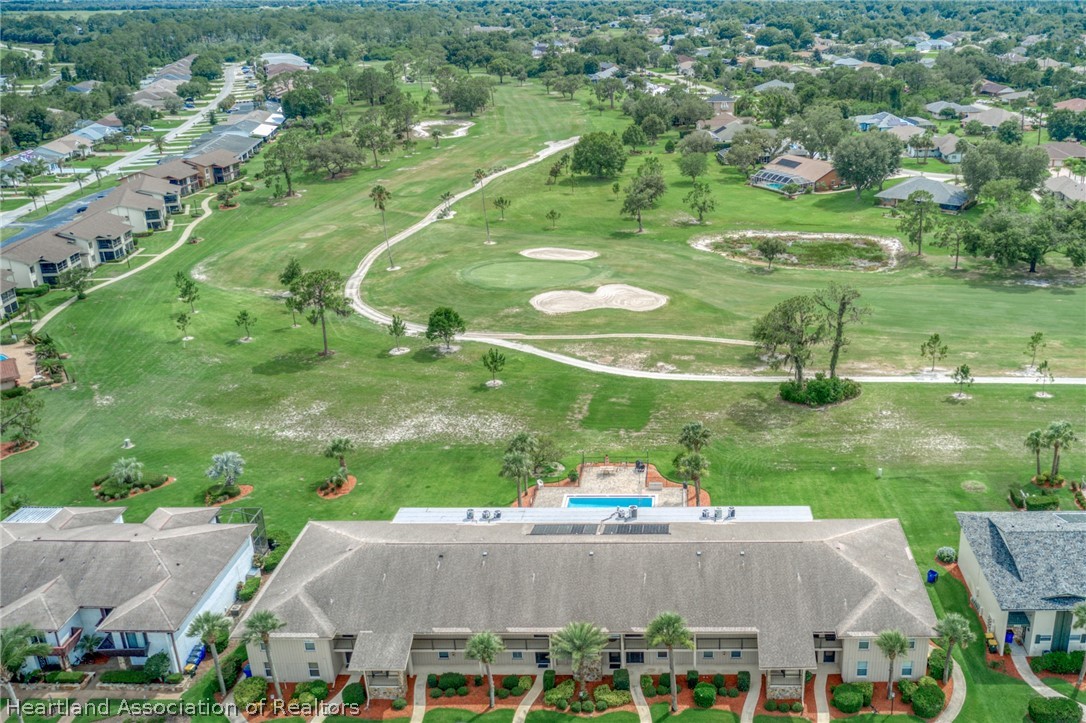 3607 Edgewater Drive Sebring, FL 33872 - Photo 20 of 22 an aerial view of residential houses with outdoor space and street view